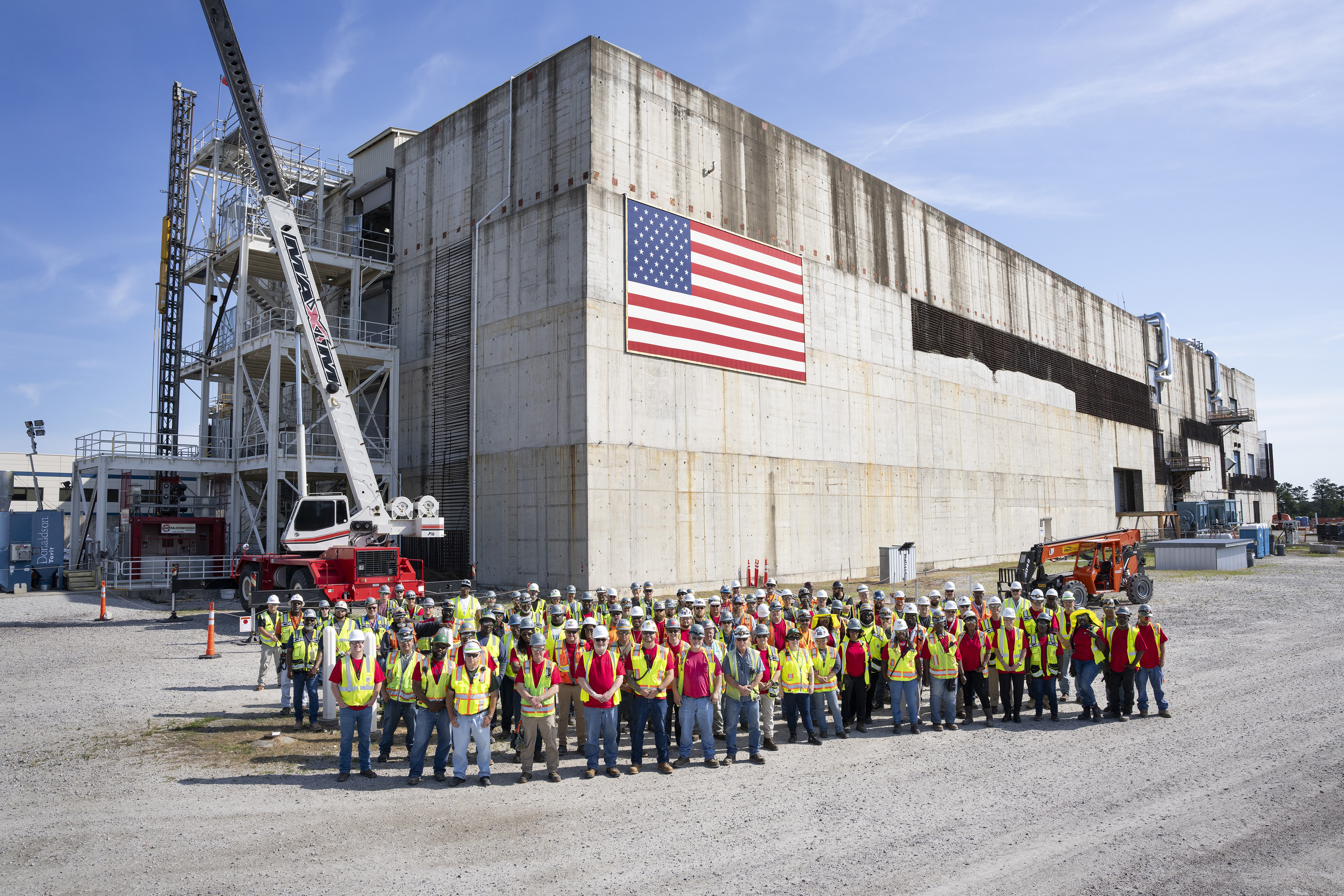 Construction workers standing on site